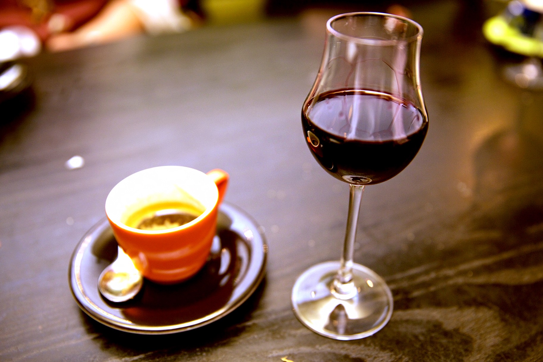 Cup of coffee and glass of wine.